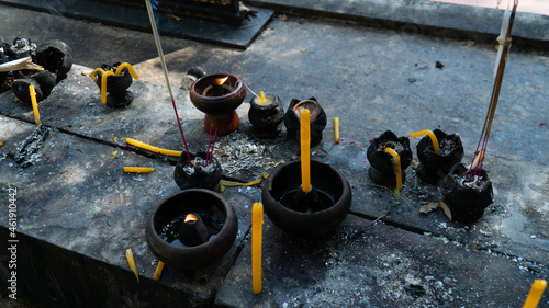 Candles burning at Buddhist Temple in Chiang Mai Thailand. (ID: 461910442)