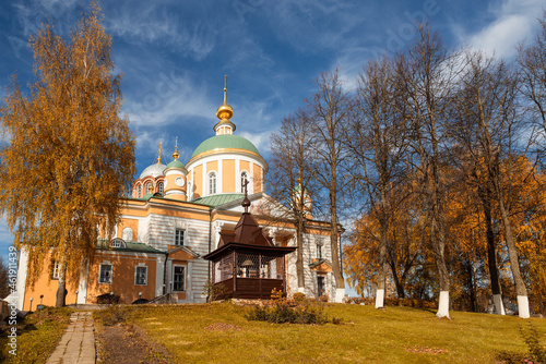 View of the Pokrovsky cathedral of the Pokrovsky Khotkov monastery in autumn. Khotkovo city, Moscow region, Russia