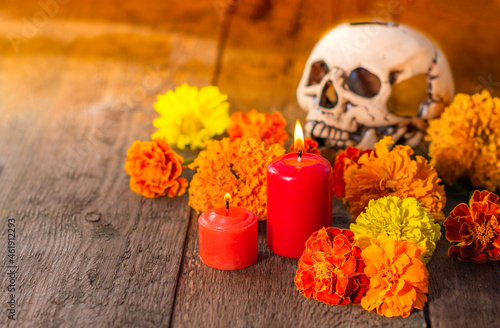 Skull, candles and cempasuchil flowers or marygold. Day of the dead concept dia de los muertos photo