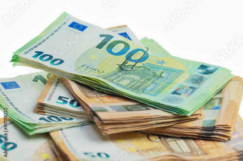 Six bundles of euro notes, 100s and 50s.