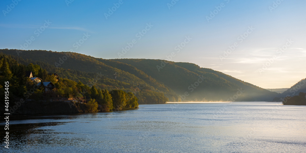 morning landscape of mountain lake at sunrise. beautiful autumnal countryside scenery with fog on the water in the distance. cold somes water reserve of cluj country, romania morning landscape of mountain lake at sunrise. beautiful autumnal countryside scenery with fog on the water in the distance. cold somes water reserve of cluj country, romania