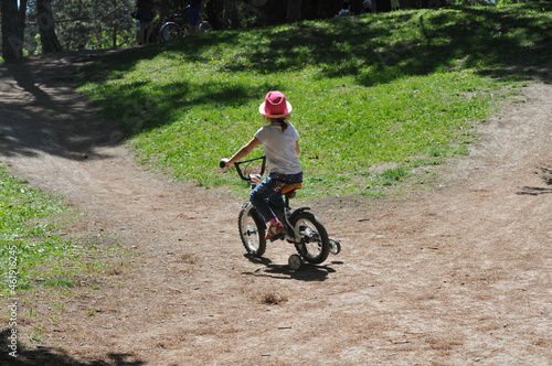 Fototapeta Naklejka Na Ścianę i Meble -  child riding a bicycle