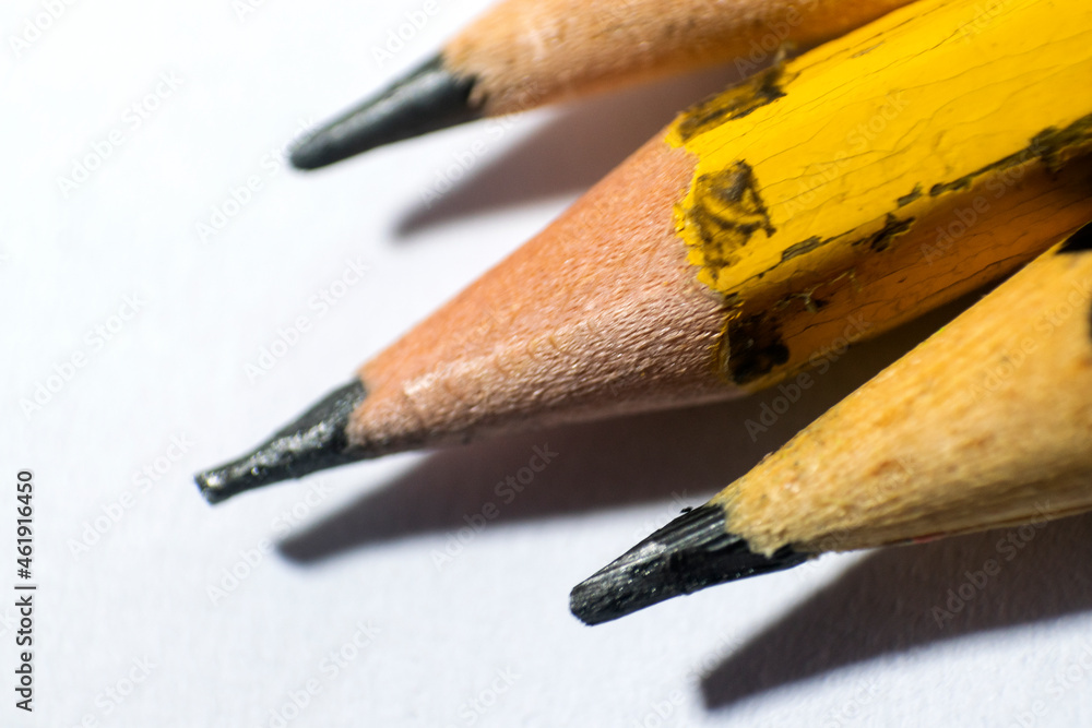 Graphite pencil tip macro on white background, concept and idea of leading.
Graphite pencil tip macro on white background, concept and idea of leading.