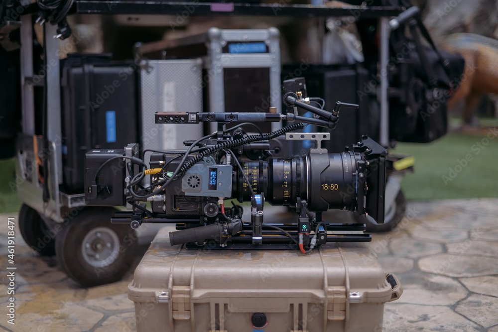 A professional film and video camera on the set. Filming day, equipment and crew. Technique of modern video filming. A professional film and video camera on the set. Filming day, equipment and crew. Technique of modern video filming.