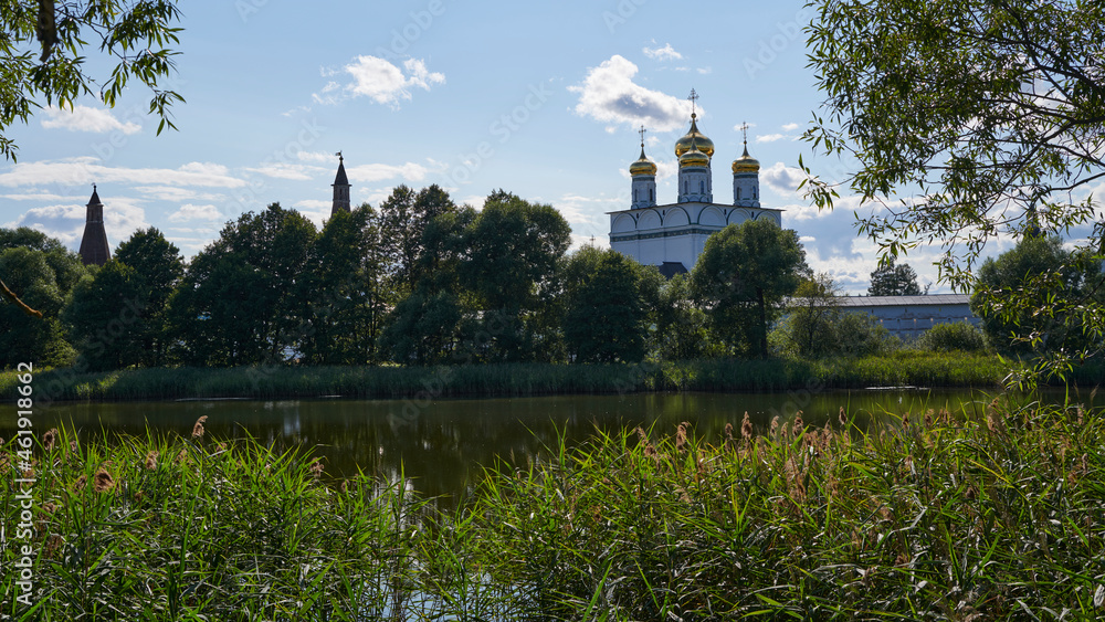 Russia. Joseph-Volokolamsk Monastery. View across the Guryevskoe lake. Resurrection and Clock Towers. Assumption Cathedral