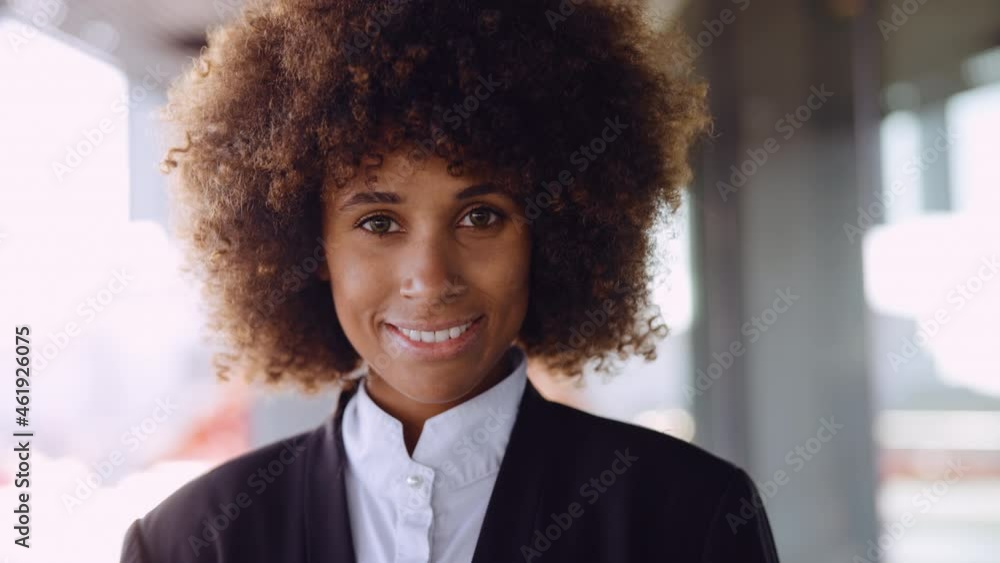 Businesswoman With Afro Hair Smiling To Camera Businesswoman With Afro Hair Smiling To Camera