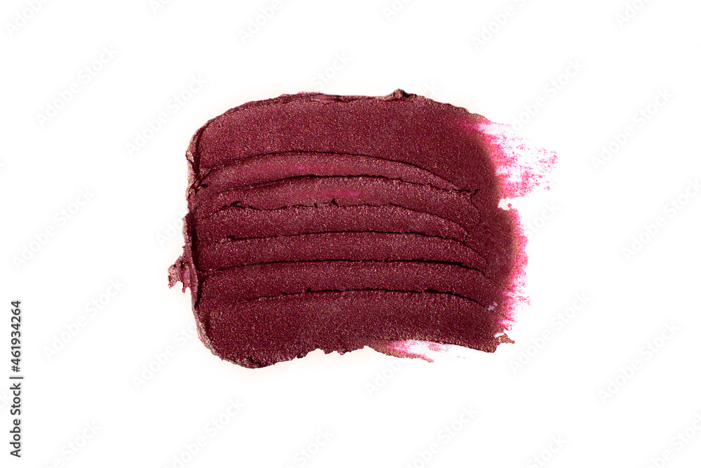 Fototapeta premium Smear of burgundy lipstick,isolated on white.Cosmetics background with negative space.