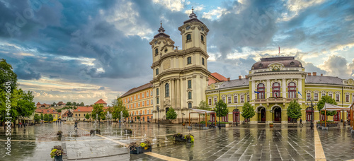 Panoramic view of Dobo square with the baroque church, Eger castle stormy weather sky in Hungary 
