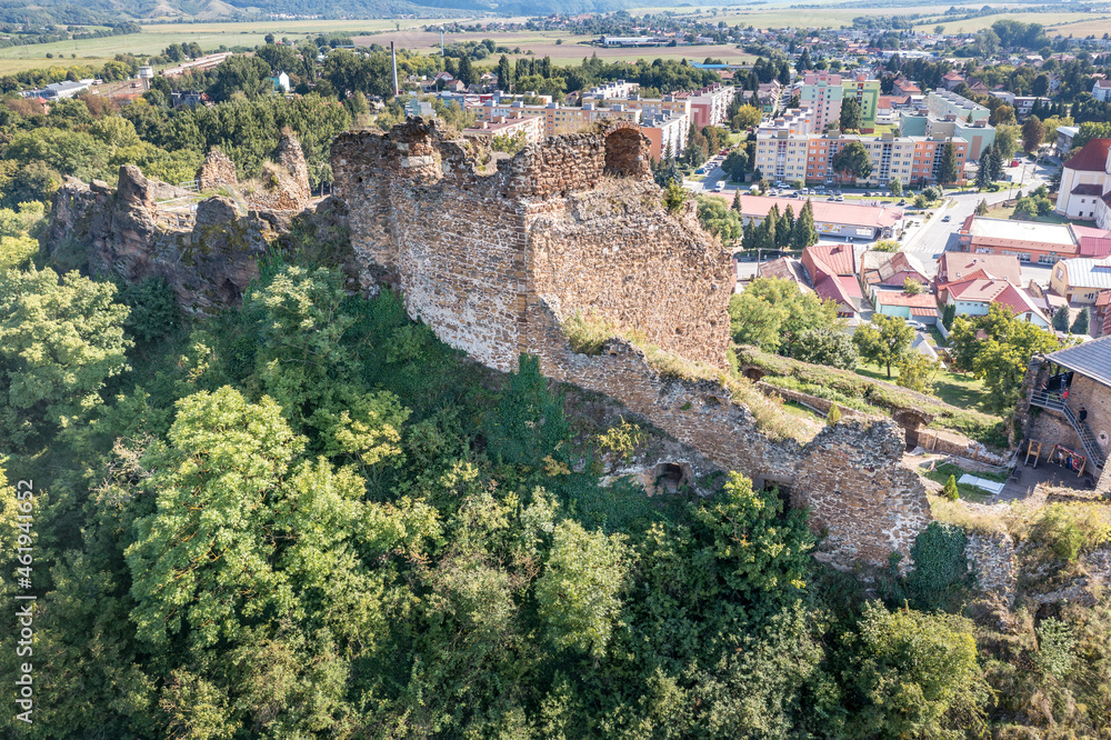 Aerial view of partially restored medieval Filakovo Fulek castle in Southern Slovakia with cannon bastion summer view with blue cloudy sky historic monument from the Turkish Hungarian wars