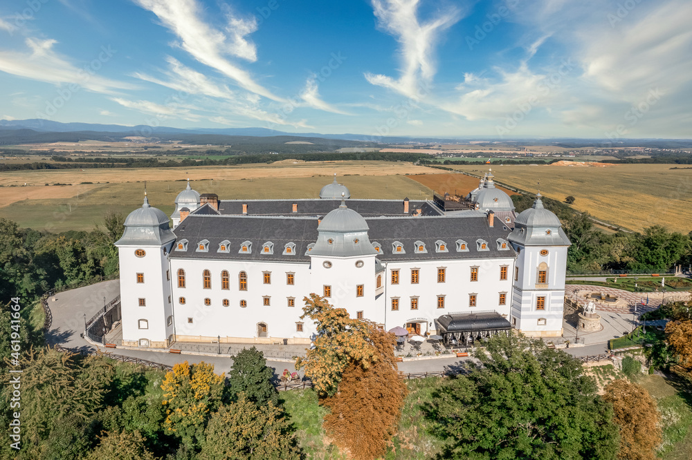 Aerial view of Halic castle in Slovakia, mansion with manicured garden brick driveway with pattern