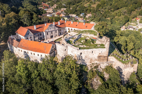 Aerial panoramic view of Gothic hilltop ruined castle Kekko, Modry Kamen or Blue Stone, in Southern Slovakia above a village