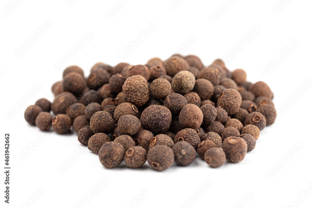 A Pile of Whole Allspice Berries on a White Background A Pile of Whole Allspice Berries on a White Background