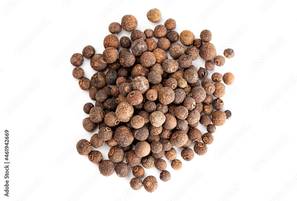 A Pile of Whole Allspice Berries on a White Background A Pile of Whole Allspice Berries on a White Background