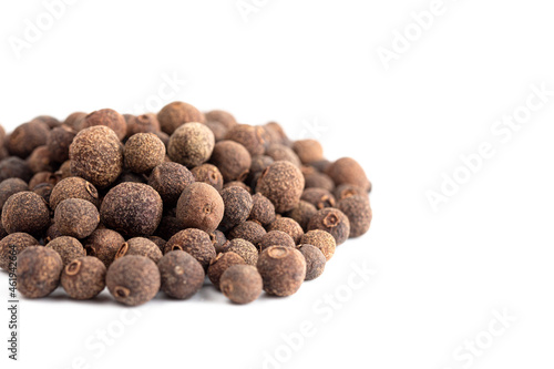 A Pile of Whole Allspice Berries on a White Background