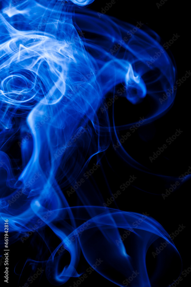 Motion blue smoke on black background.