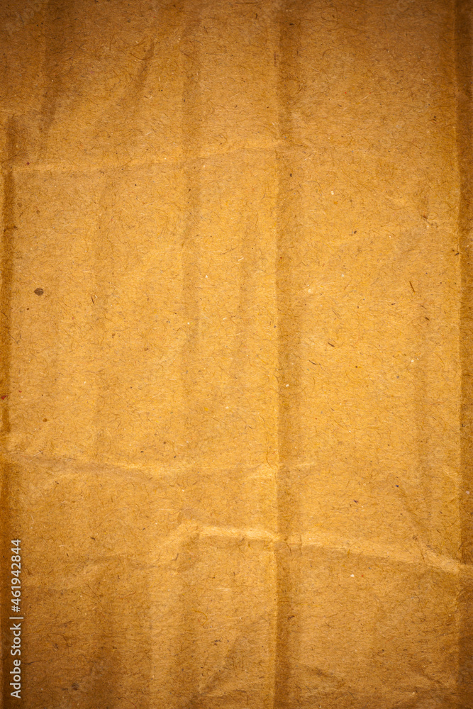 Textured crumpled brown cardboard paper background. Textured crumpled brown cardboard paper background.