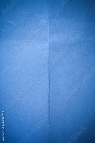 Blue recycled paper background.