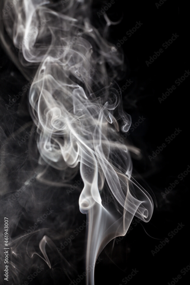 White smoke on black background.