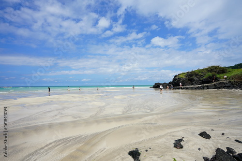 a wonderful shoaling beach with clear water, scenery around hamdeok beach
 photo