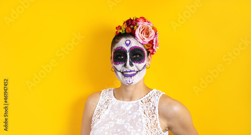 Mexican Catrina, portrait of young latin woman for Halloween party in Mexico city 