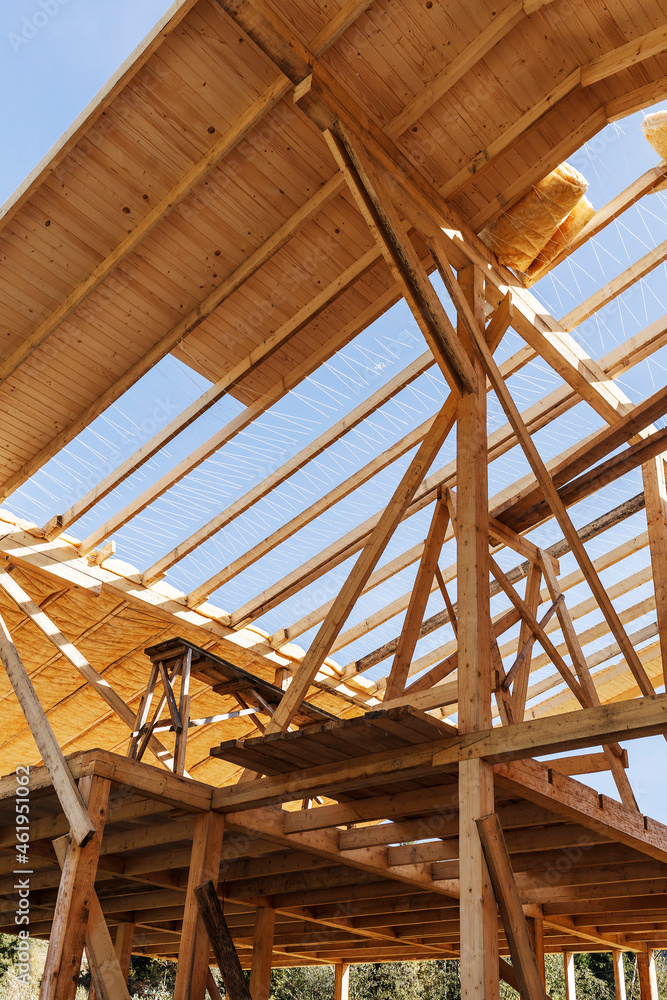 Obraz premium Construction of a frame wooden house