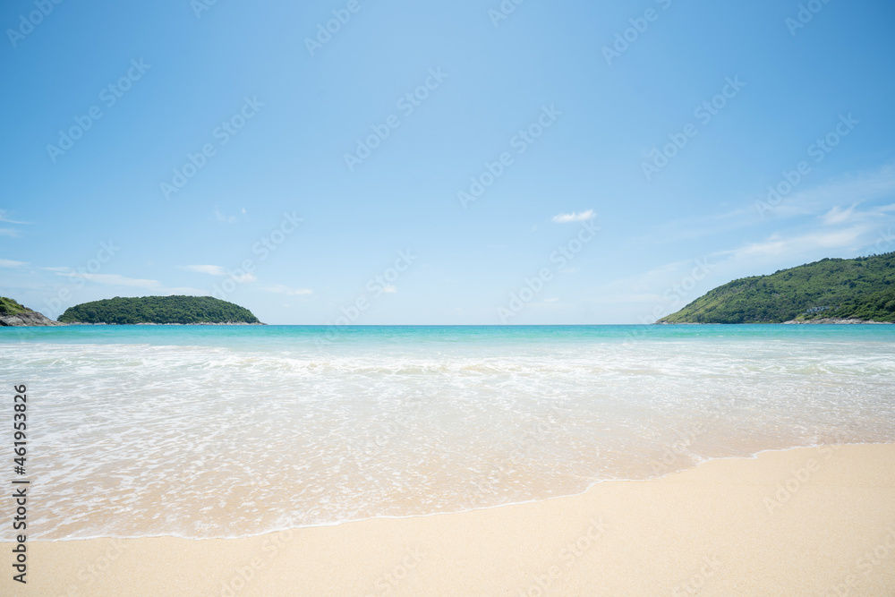 Beautiful sea middle two mountains blue sky background.Landscape view beach sea and sand on summer.