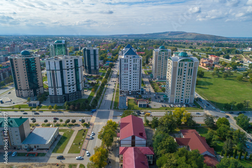 View of the buildings of the "Gudermes City"business center on a sunny September day (aerial photography). Chechen Republic, Russia