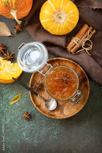 Wallpaper Mural Homemade preserved, delicious sweet spicy sauce. Pumpkin confiture, jam, chutney sauce with spices on stone table. Top view flat lay. Copy space. Torontodigital.ca