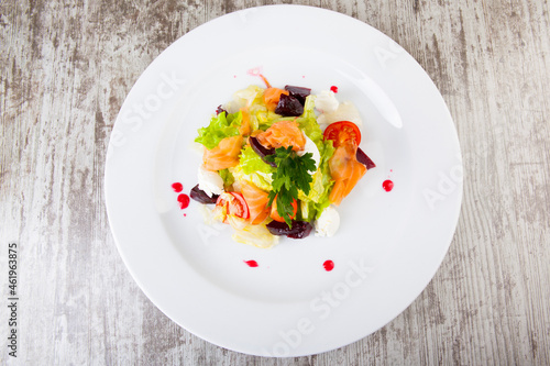 salad with salmon vegetables with sweet sauce