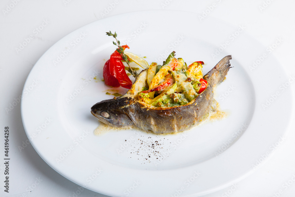 BBQ fish stuffed with vegetables and cheese BBQ fish stuffed with vegetables and cheese