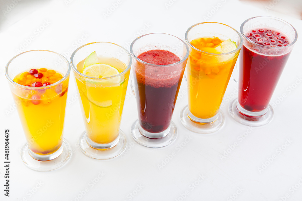 hot berry drinks in a glass glass on a white background hot berry drinks in a glass glass on a white background