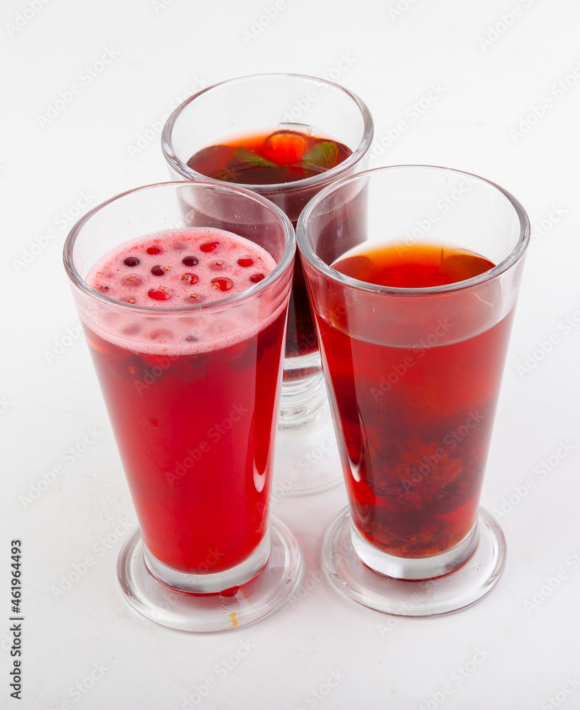 hot berry drinks in a glass glass on a white background hot berry drinks in a glass glass on a white background
