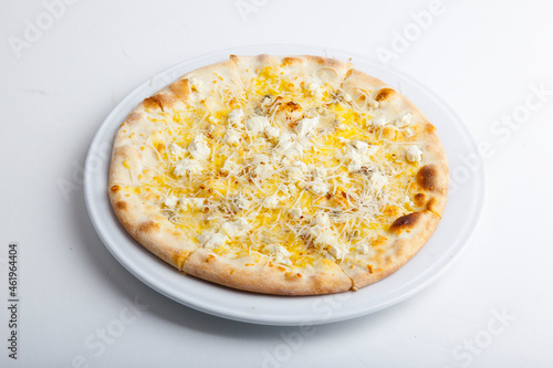 italian pizza on white plate and white plate