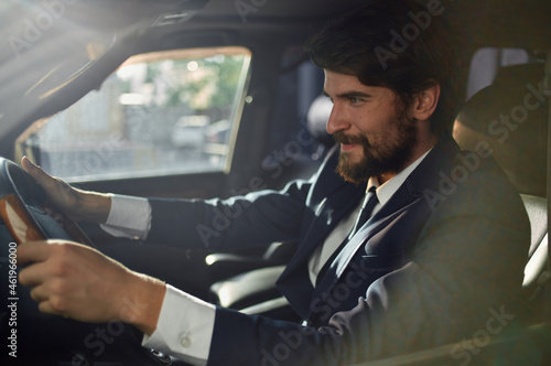 businessmen in a suit in a car a trip to work self confidence © SHOTPRIME STUDIO