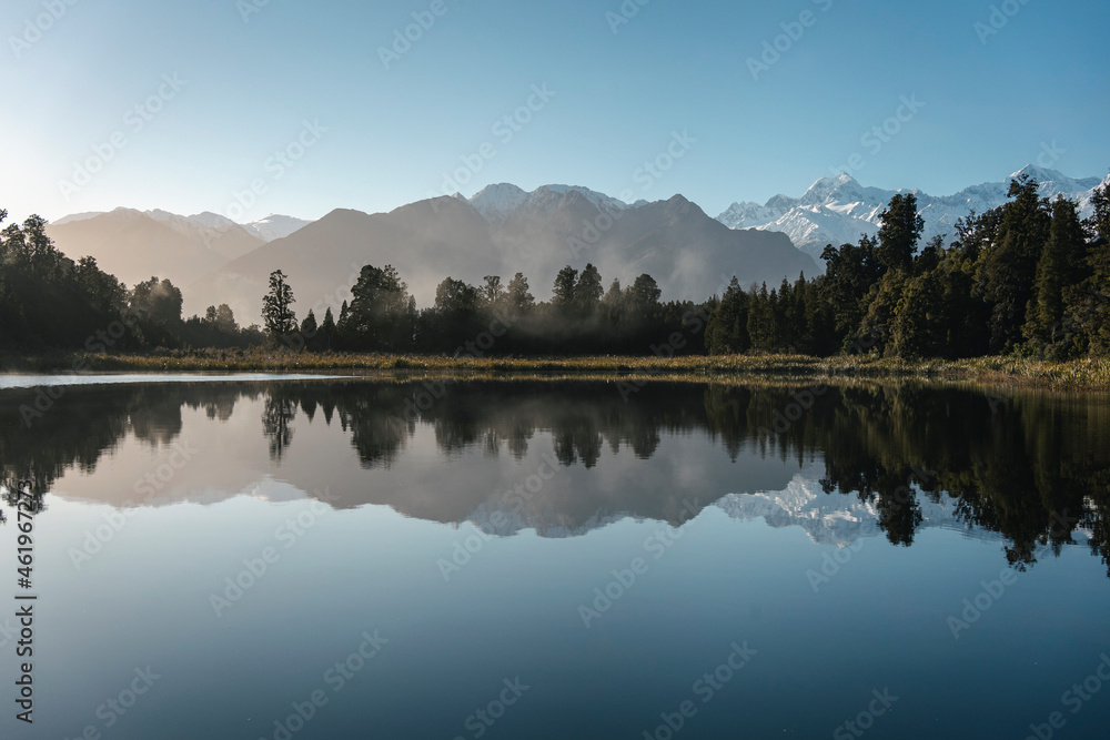 Reflection of mirror Lake Matheson located in the West Coast, New ...