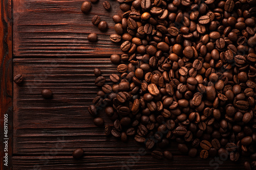 Fresh roasted beans on a wooden table