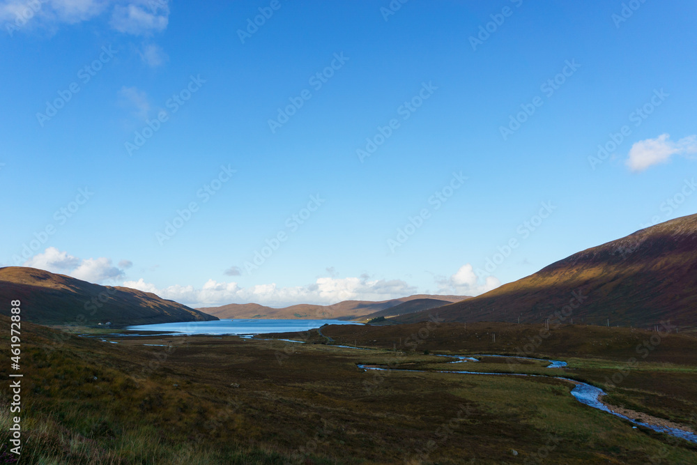 Loch Ainort with river in the setting sunlight, Isle of Skye, Scotland