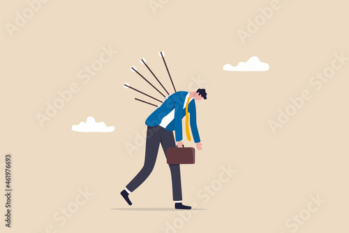Victim from business betrayal, pain from failure or stressed, anxiety and violence by social bullying, overworked problem concept, depressed exhausted businessman walking with painful bows on his back
