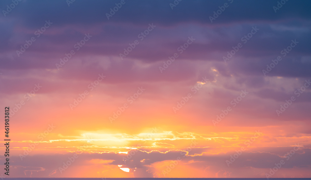 Fototapeta premium Natural background, stunning view of a dramatic, cloudy sunrise. Romantic sky, copy space, sky replacement, Sardinia, Italy.