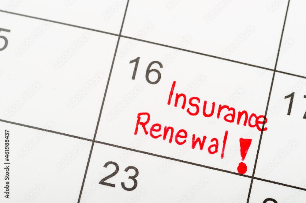 Insurance Renewal written on a calendar to remind you and important appointment. Insurance Renewal written on a calendar to remind you and important appointment.