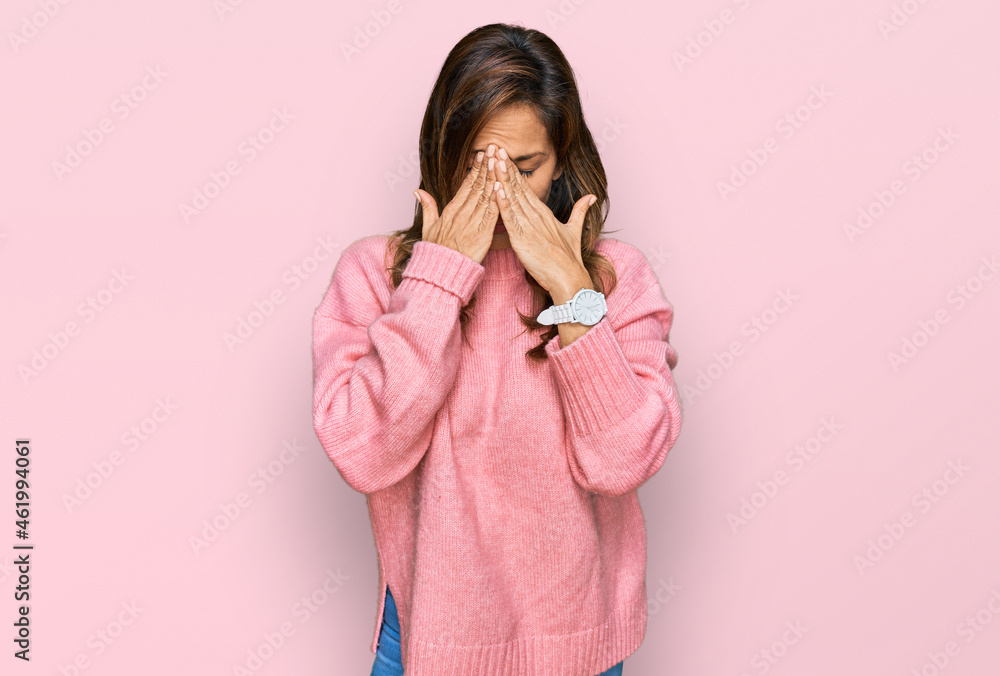 Young hispanic woman wearing casual clothes rubbing eyes for fatigue and headache, sleepy and tired expression. vision problem Young hispanic woman wearing casual clothes rubbing eyes for fatigue and headache, sleepy and tired expression. vision problem