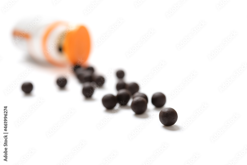 pills and bottle on a white backgrond pills and bottle on a white backgrond