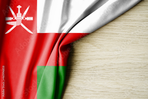 Oman flag. Fabric pattern flag of Oman. 3d illustration. with back space for text.