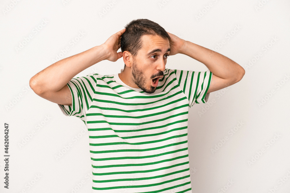 Young caucasian man isolated on white background screaming, very excited, passionate, satisfied with something. Young caucasian man isolated on white background screaming, very excited, passionate, satisfied with something.