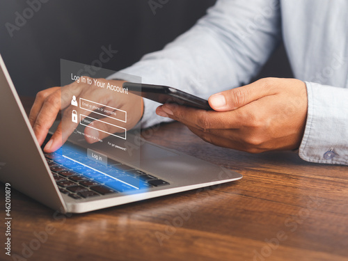 Cyber security concept. The login page on the virtual screen to the computer system on the laptop. Business, technology, and networking conceptual