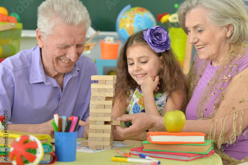 happy family playing with wooden blocks