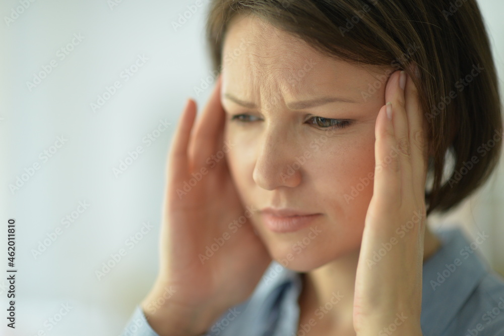 beautiful young ill woman with headache at home beautiful young ill woman with headache at home