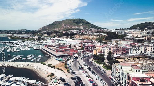 Amazing aerial view of beautiful port of Pozzuoli in summer season, Italy. Drone viewpoint