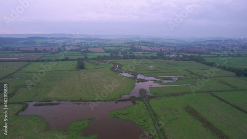 Wetlands and meadows in RSPB Exminster and Powderham Marshe from a drone, Exeter, Devon, England photo