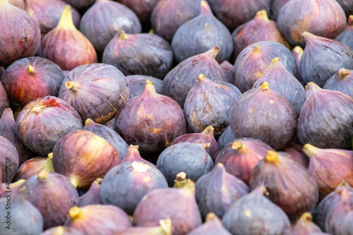 Lots of purple figs. Ripe organic fruits.